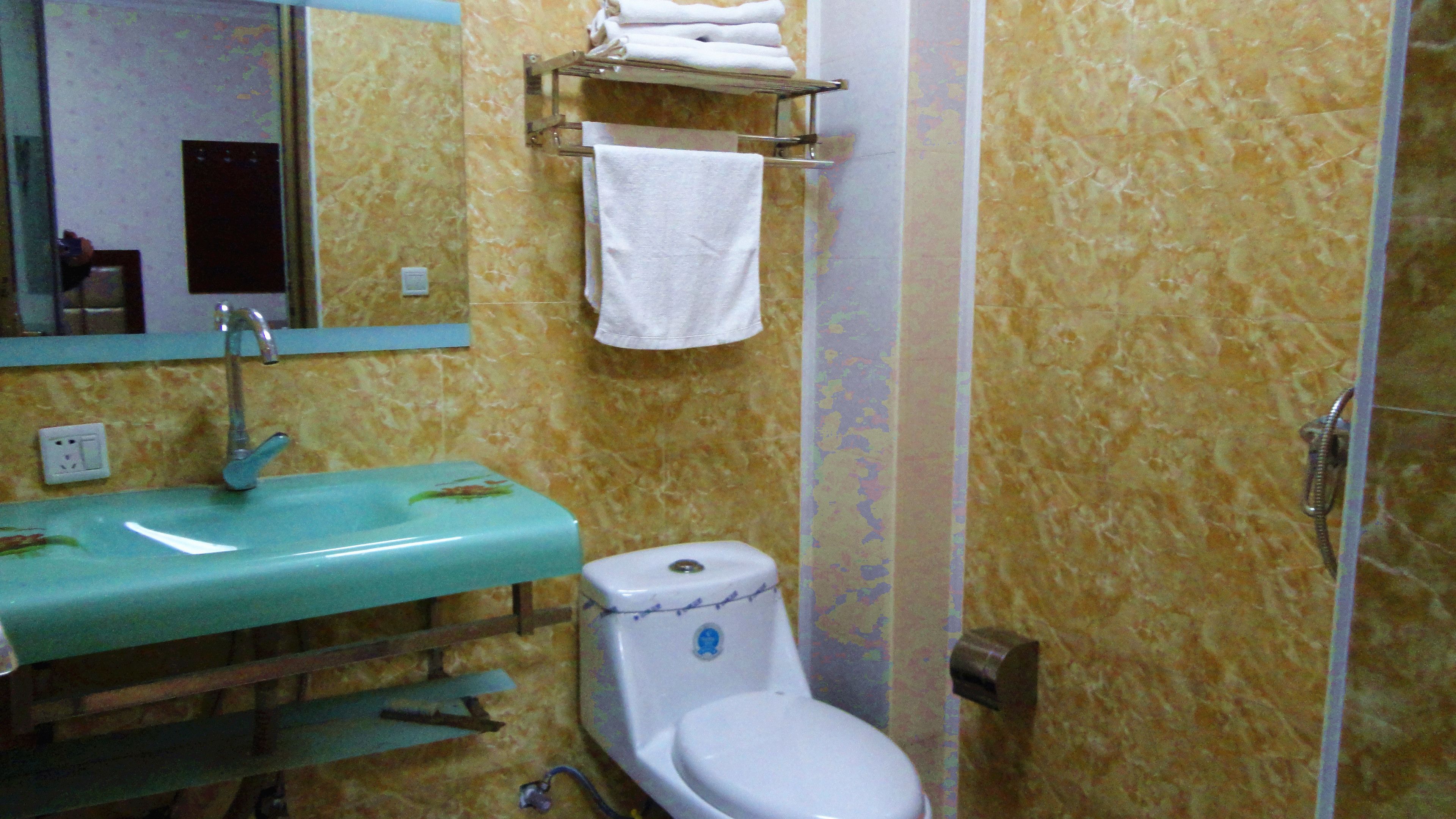 shower, free toiletries, dressing gowns, slippers