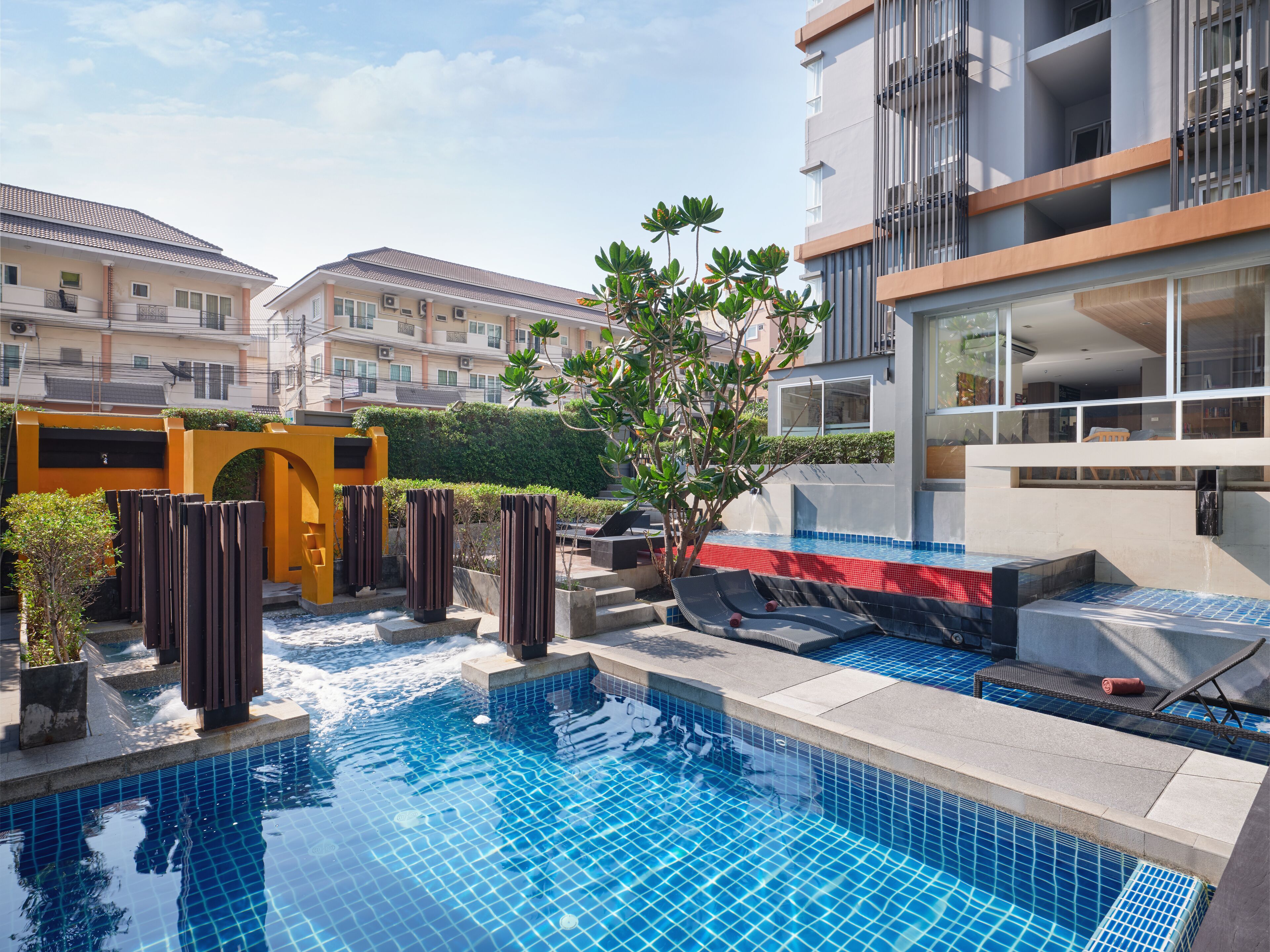 outdoor pool, pool umbrellas, pool loungers