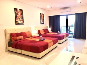 Estudio Deluxe, vistas a la ciudad | Tabla de planchar con plancha y wifi gratis