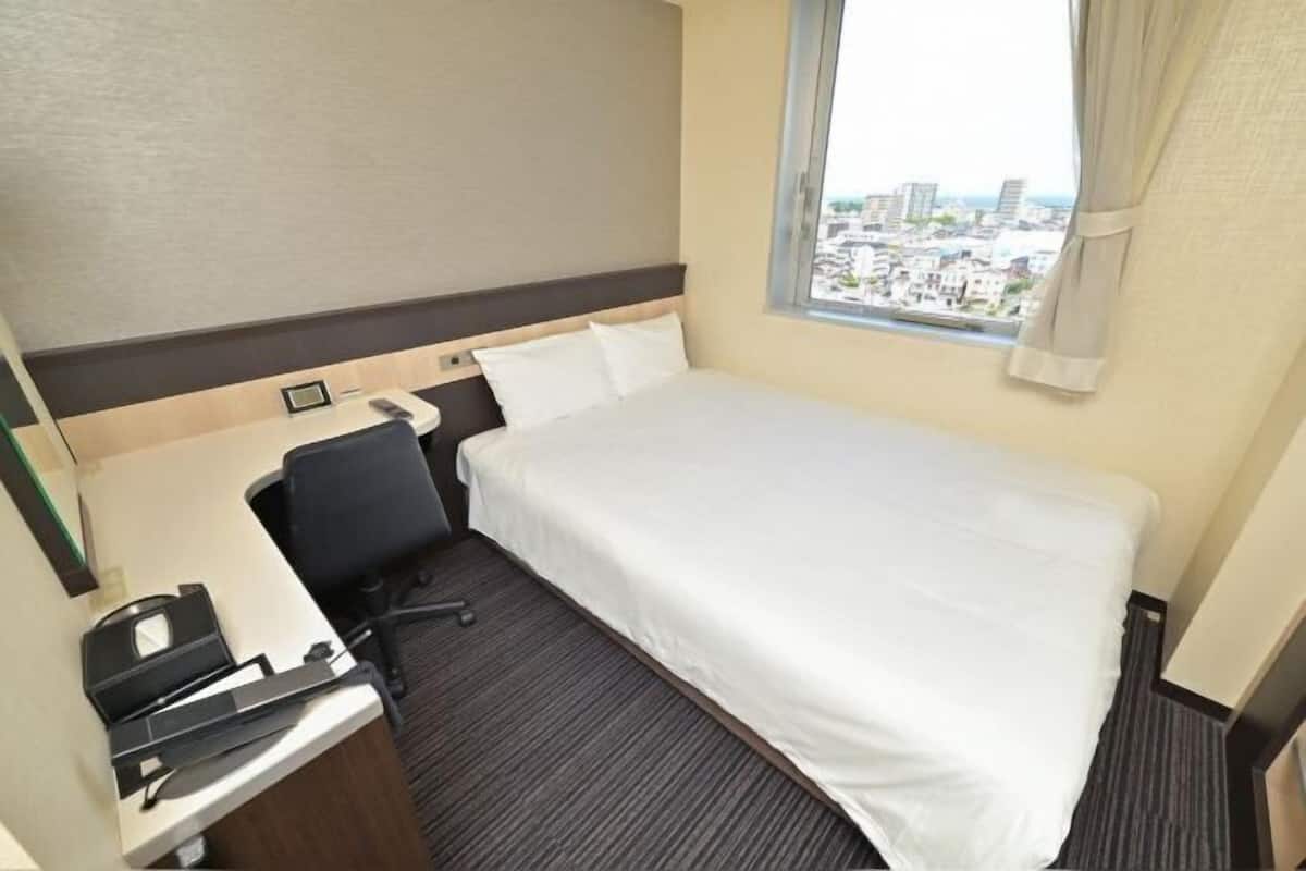 Down duvets, desk, blackout curtains, iron/ironing board