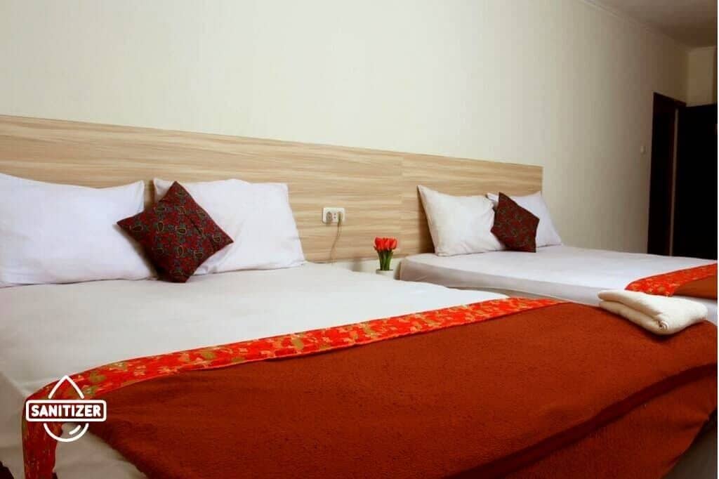 Family Room | Desk, bed sheets