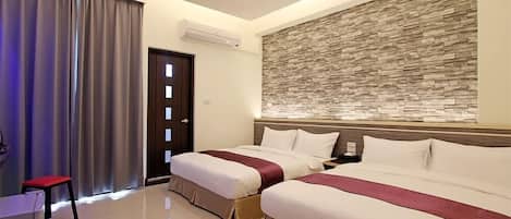 Grand Quadruple Room, 1 Bedroom | Minibar, desk, blackout drapes, soundproofing