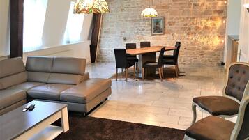 Deluxe Apartment, 2 Bedrooms, Terrace, Executive Level | Living area | Flat-screen TV