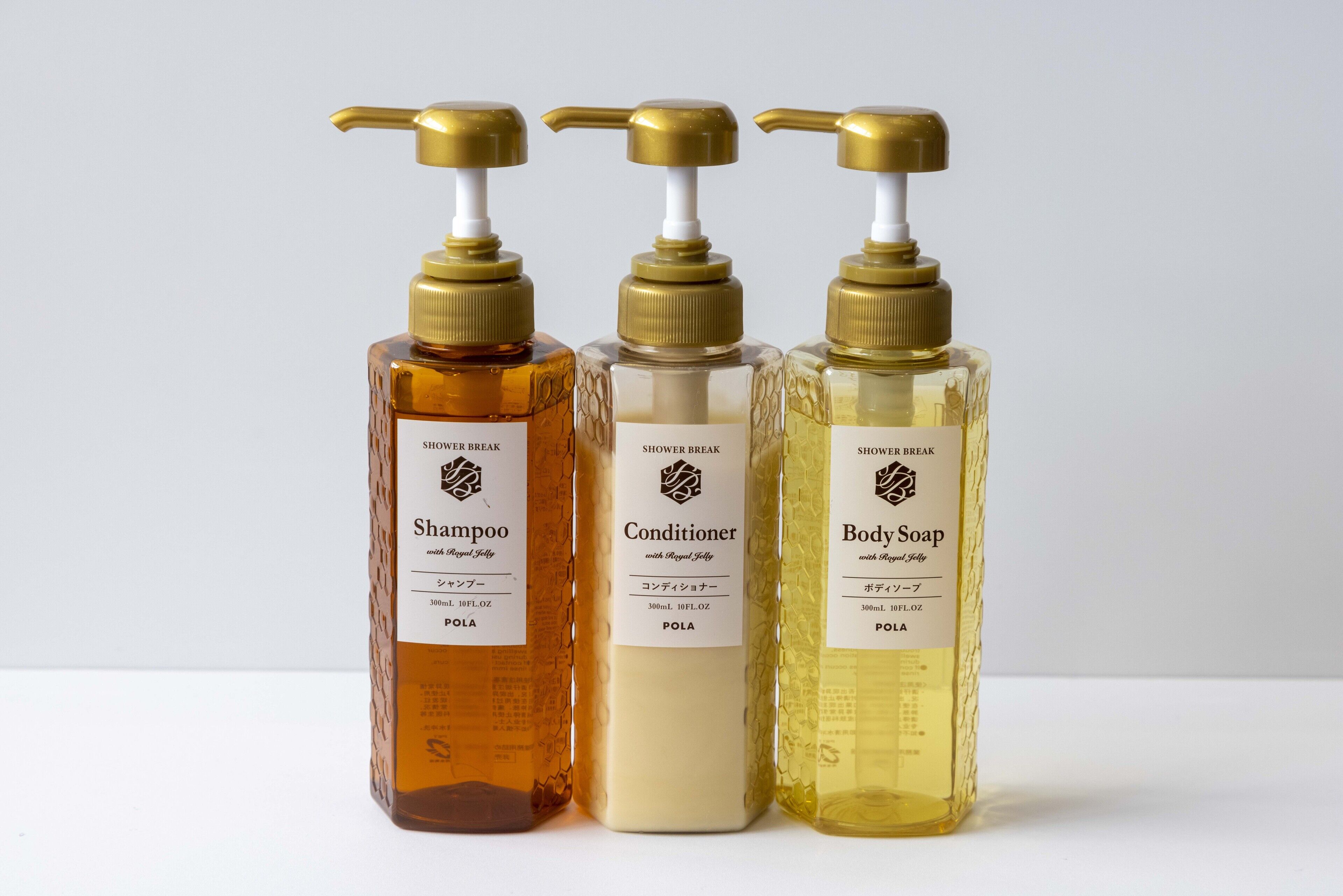 Three bottles of Shower Break products: Shampoo, Conditioner, and Body Soap.