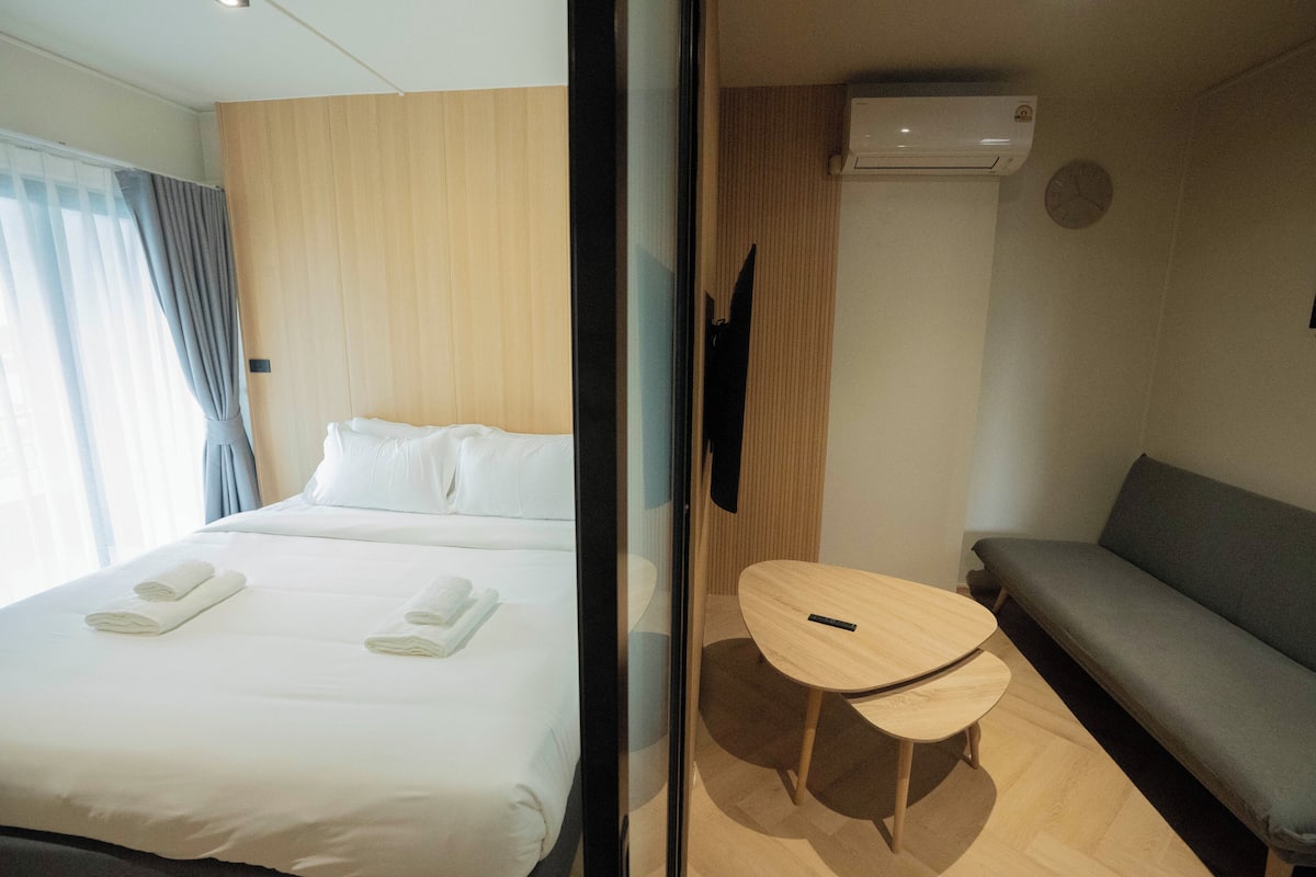 Desk, laptop workspace, blackout curtains, free WiFi