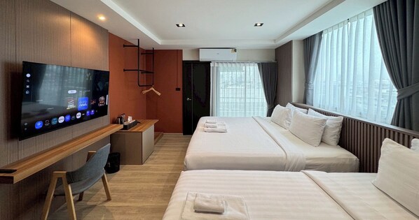 Desk, laptop workspace, blackout curtains, free WiFi