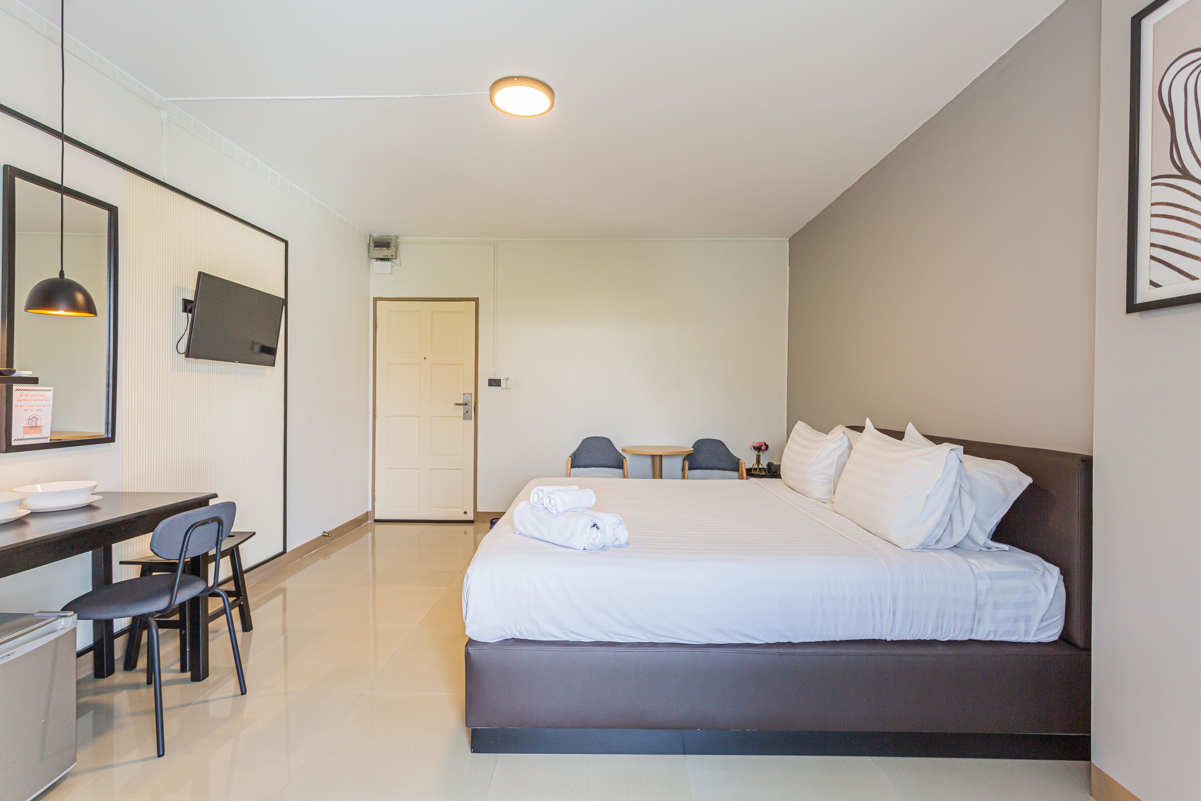 deluxe double room with balcony | desk, laptop workspace, blackout curtains, free wifi