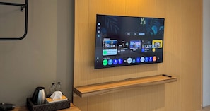 Desk, laptop workspace, blackout curtains, free WiFi