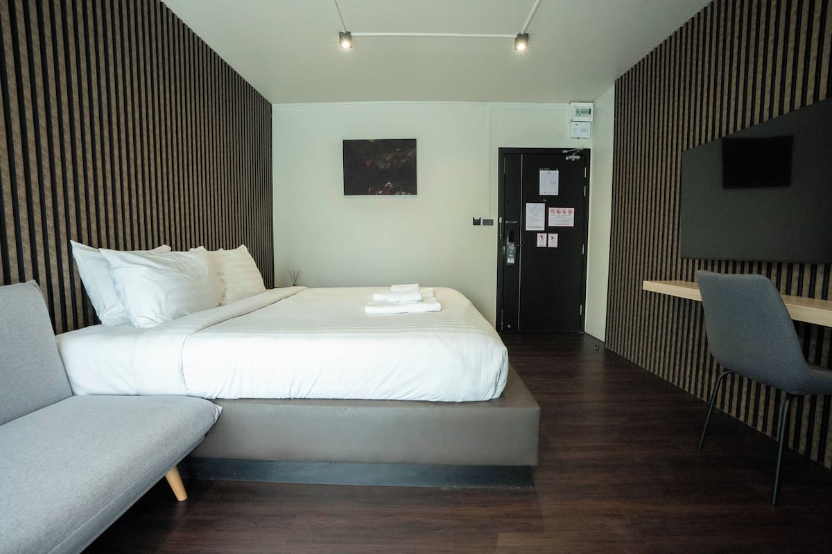 Desk, laptop workspace, blackout curtains, free WiFi