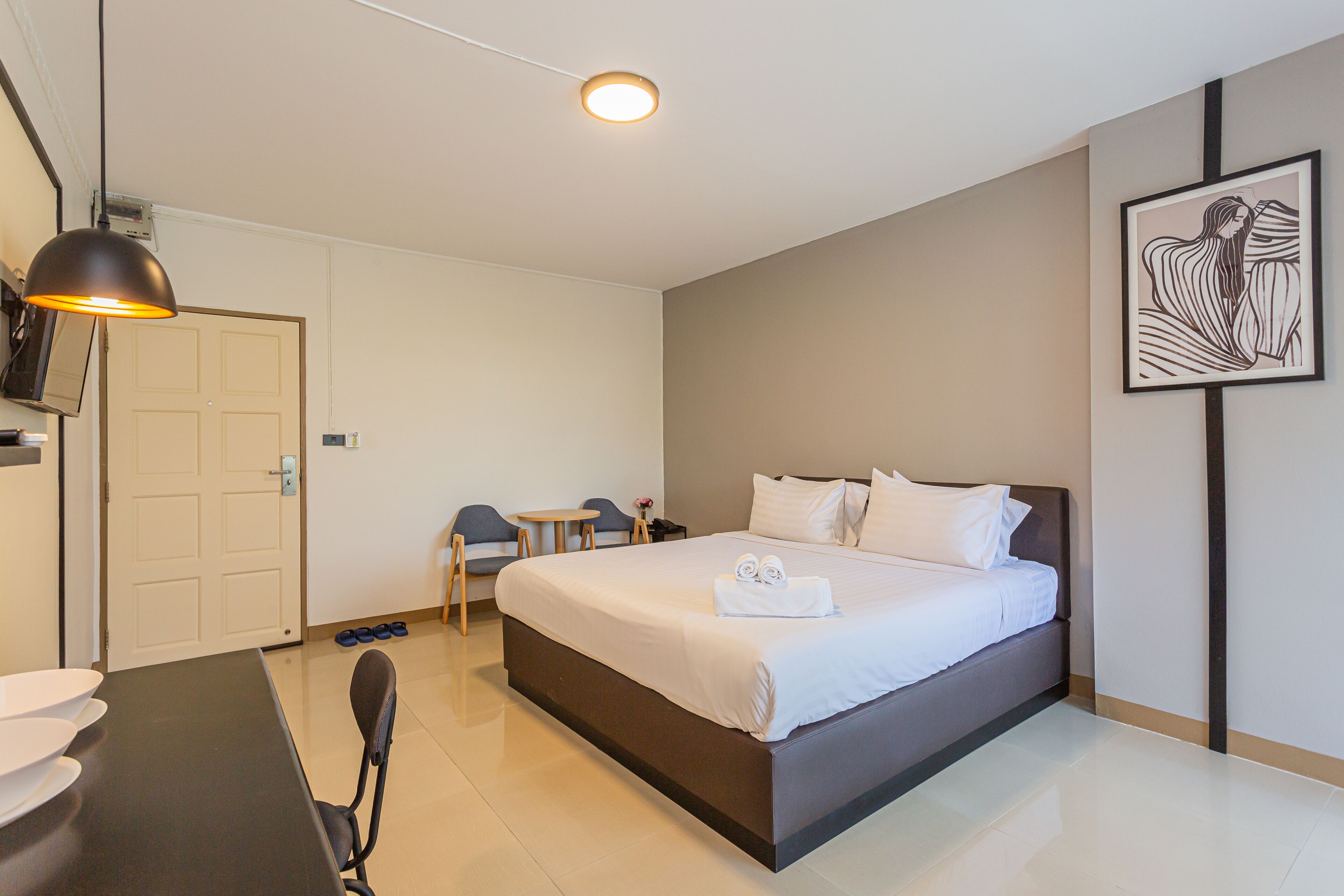 deluxe double room with balcony | desk, laptop workspace, blackout curtains, free wifi