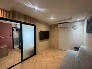 Desk, laptop workspace, blackout curtains, free WiFi