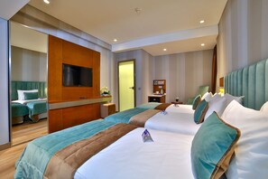 Quarto triplo standard | Frigobar, cofres nos quartos, quartos à prova de som