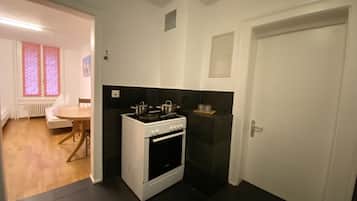 Economy Quadruple Room, 1 Bedroom | 1 bedroom, desk, free WiFi