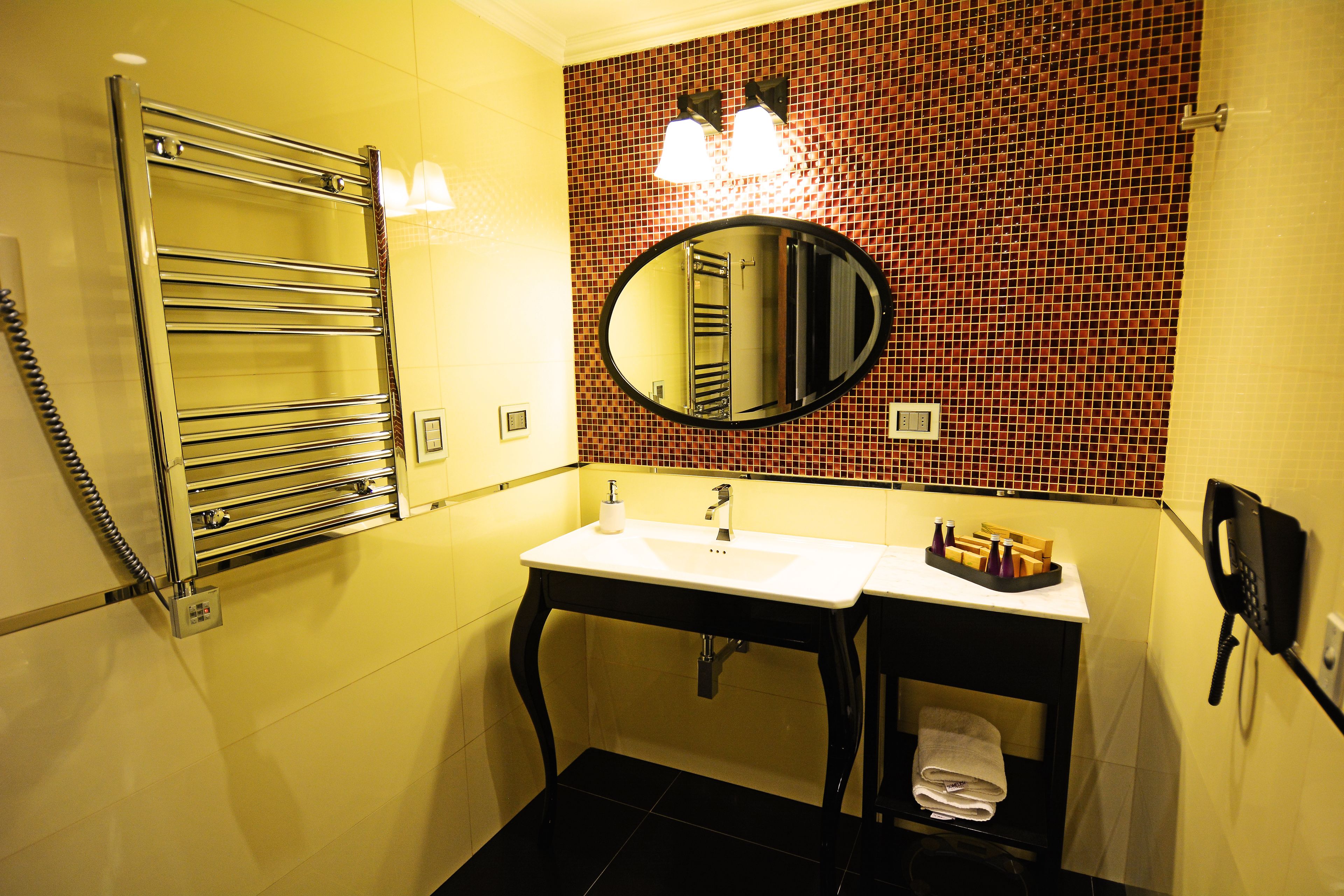 premium suite, 1 bedroom, city view | bathroom | shower, rainfall showerhead, designer toiletries, hair dryer