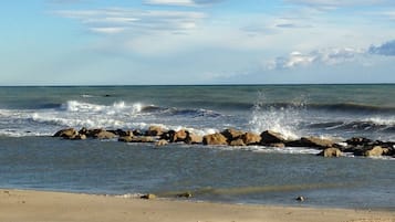 On the beach, white sand