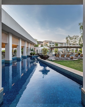 2 outdoor pools, pool umbrellas, pool loungers