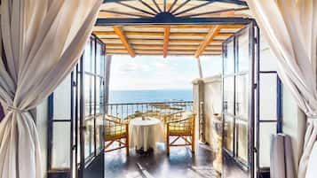 Deluxe Suite, 1 Bedroom, Balcony, Beach View (Alejandro) | Living area | 50-inch LED TV with cable channels