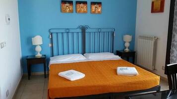 Quadruple Room, City View | Individually decorated, desk, laptop workspace, soundproofing
