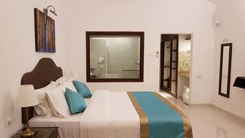 Suite | Premium bedding, in-room safe, laptop workspace, blackout curtains