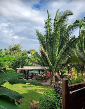Basic Double Room, Garden View, Poolside | Terrace/patio