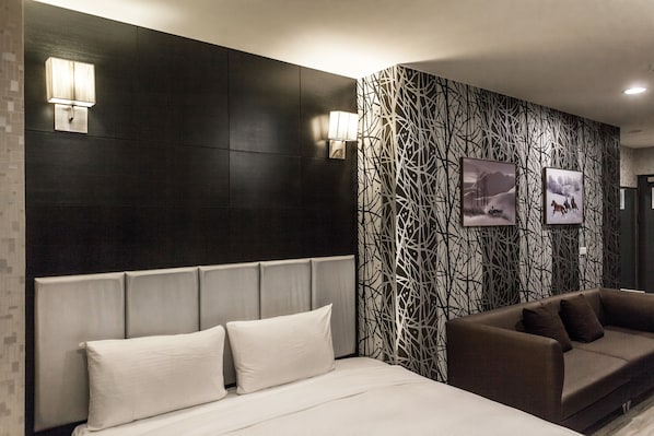 Ropa de cama de alta calidad, minibar y escritorio