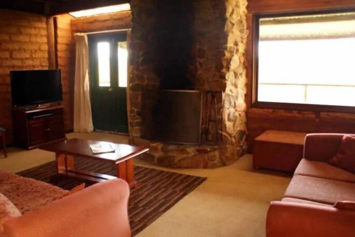 Living area | Flat-screen TV, fireplace, DVD player, pay movies