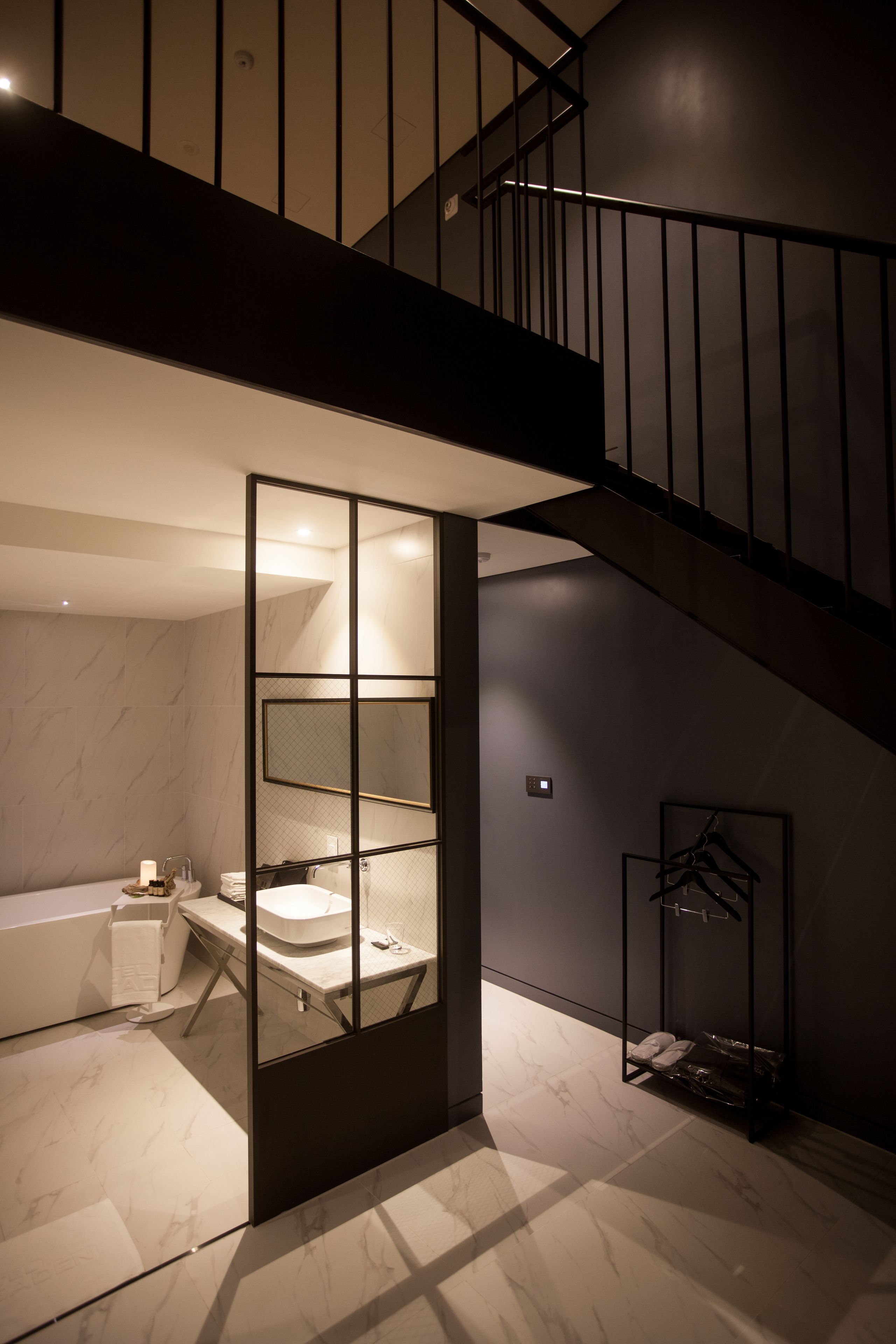 gaden suite | bathroom | deep-soaking bathtub, designer toiletries, hair dryer, bathrobes