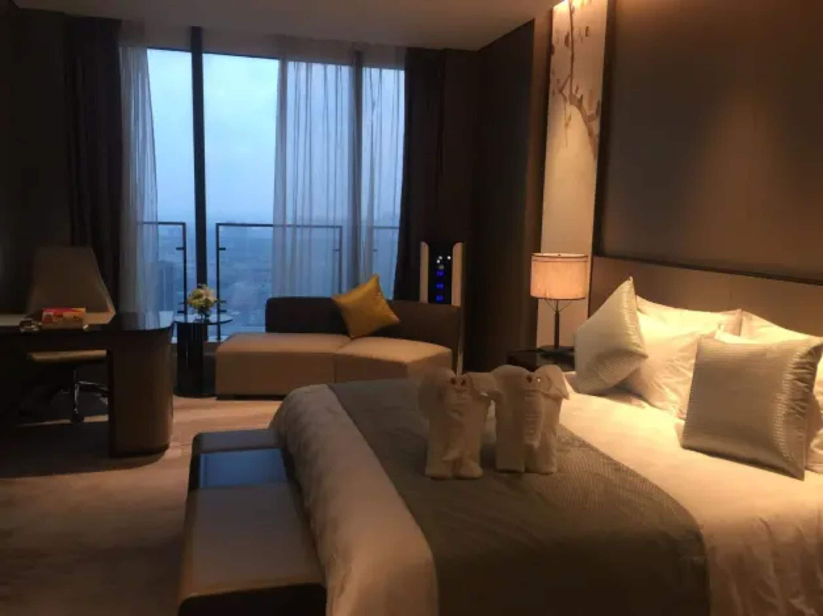 deluxe king room with view | premium bedding, minibar, in-room safe, desk