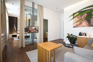 Executive Studio Suite, Balcony | Living area | LCD TV