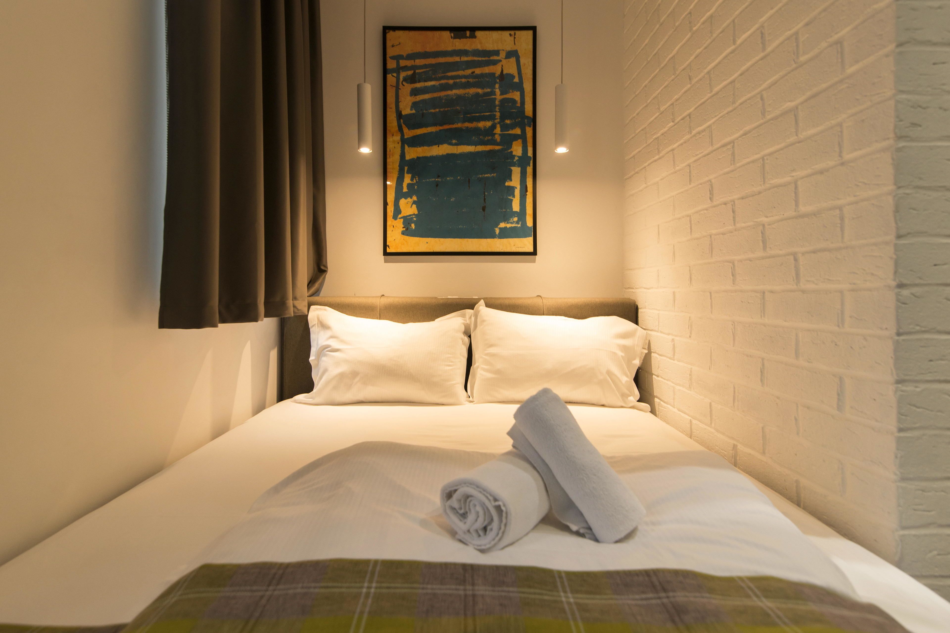 economy room | hypo-allergenic bedding, minibar, in-room safe, blackout curtains