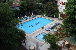 Outdoor pool, pool umbrellas, pool loungers