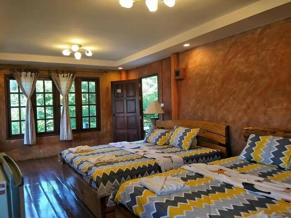 Executive Room | Minibar, WiFi (free), individually decorated, bed sheets