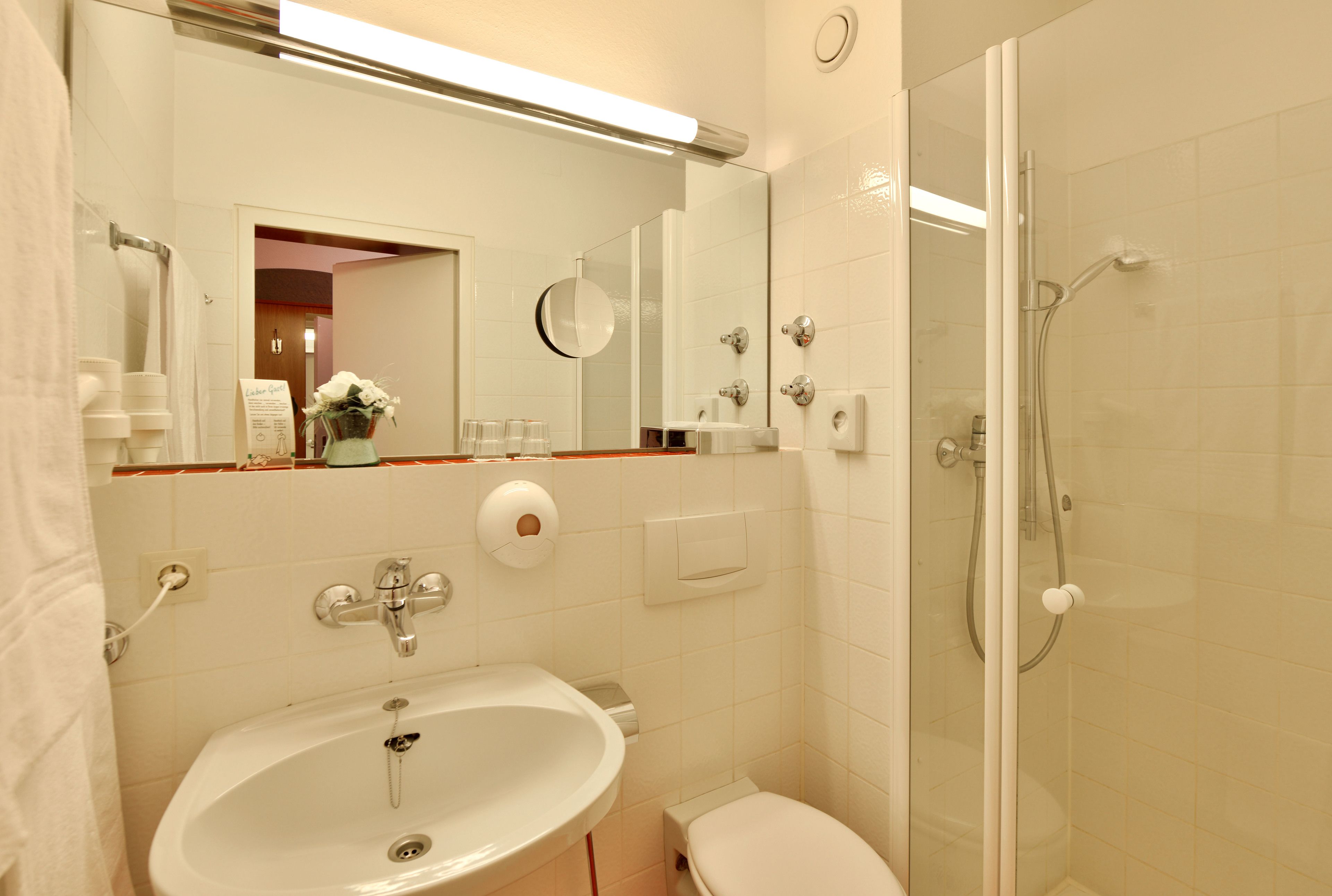 shower, hair dryer, bathrobes, towels