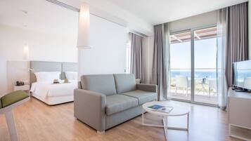 Suite, Balcony, Sea View | Minibar, in-room safe, desk, soundproofing