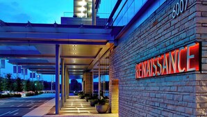 A modern building with a prominent "6007" sign and a "RENAISSANCE" sign on the side. - Renaissance Dallas at Plano Legacy West Hotel (Plano)
