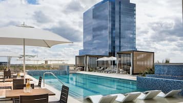 Outdoor pool, open 6:00 AM to 10:00 PM, cabanas (surcharge)