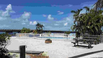 Outdoor pool, open 8:30 AM to 8:00 PM, pool loungers