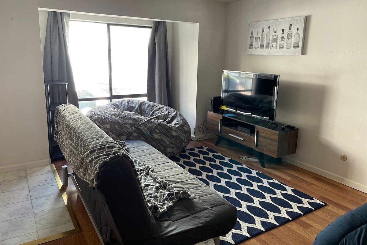 Apartment, 2 Bedrooms | Living area | LED TV, computer