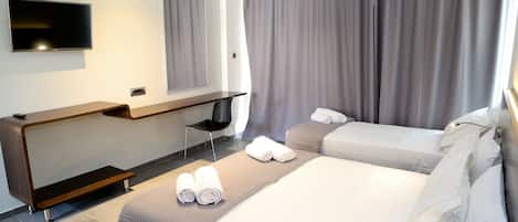 Triple Room | Premium bedding, free minibar items, in-room safe, desk