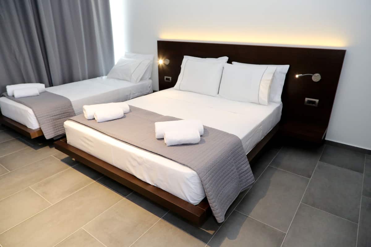 Triple Room | Premium bedding, free minibar items, in-room safe, desk