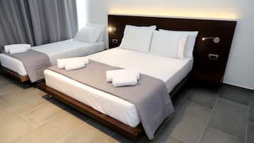 Triple Room | Premium bedding, free minibar items, in-room safe, desk