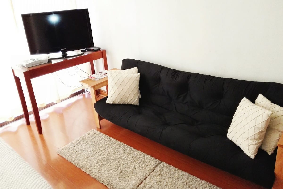 Standard Studio Suite, 1 Bedroom | Living room | Flat-screen TV