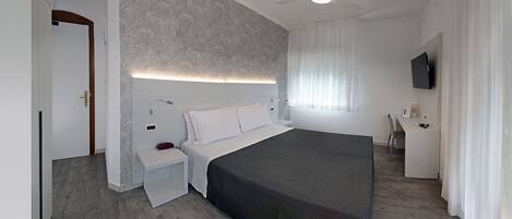 Ropa de cama de alta calidad y minibar