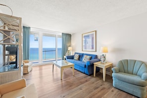 Condo, 2 Bedrooms, Ocean View, Beachfront | Living area | Flat-screen TV