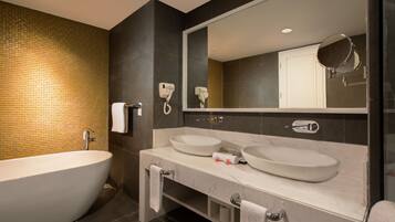 Executive Suite | Bathroom | Shower, free toiletries, hair dryer, slippers