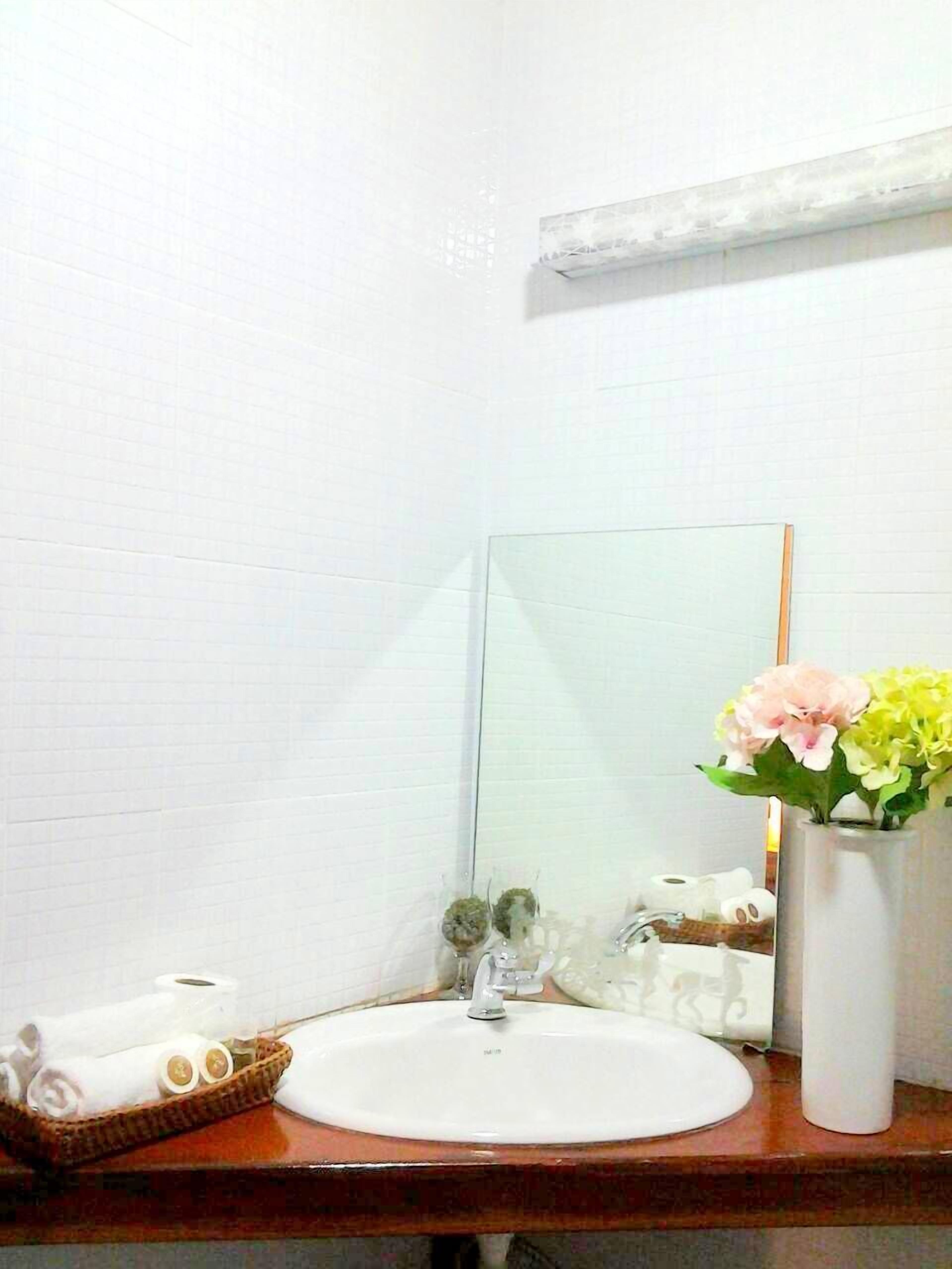 superior garden view with front balcony | bathroom | shower, towels