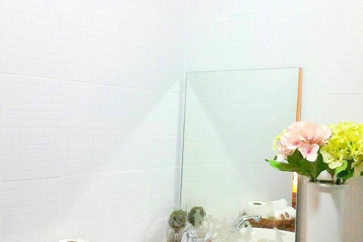 superior garden view with front balcony | bathroom | shower, towels