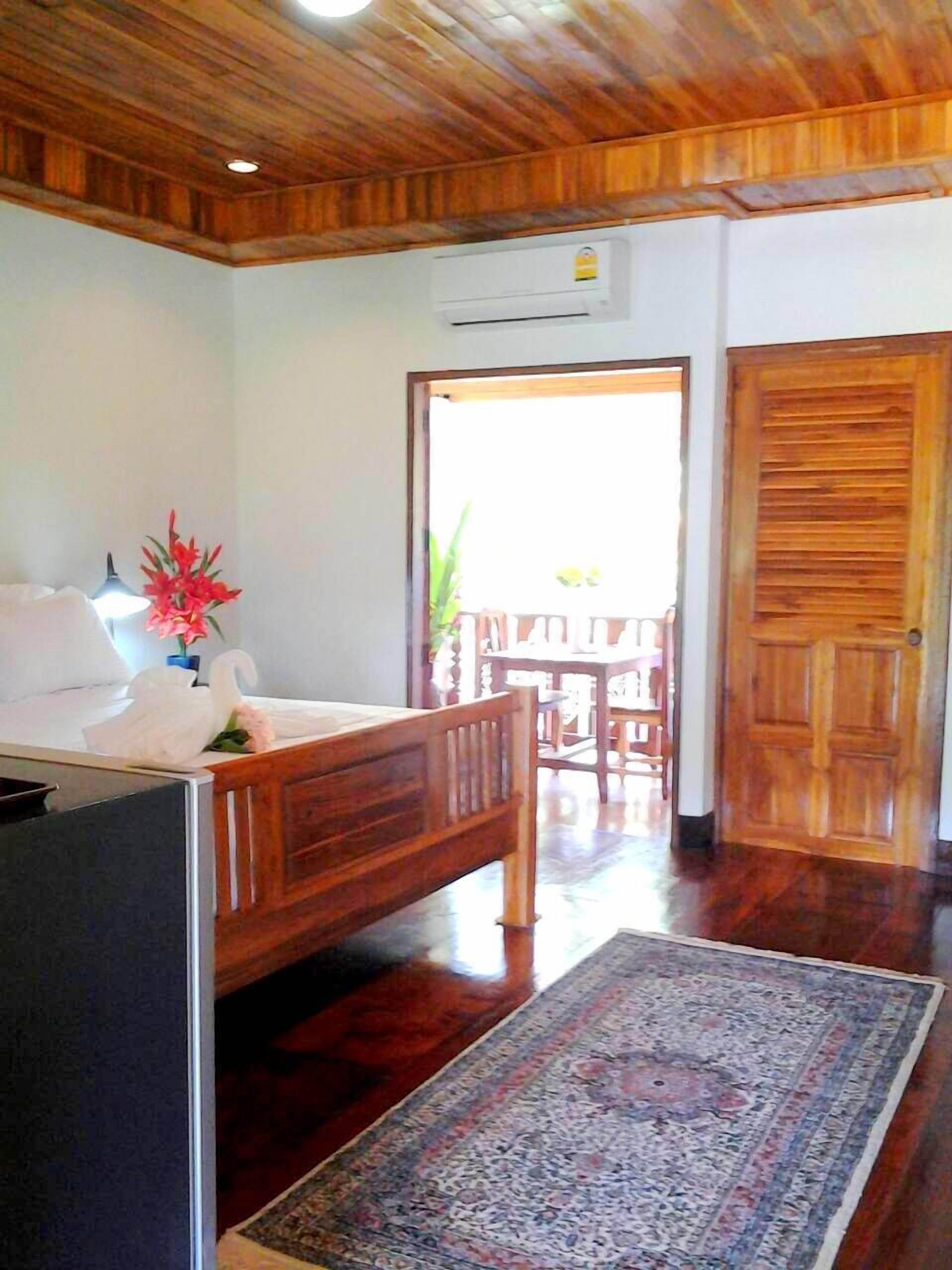 superior garden view with private back balcony | 1 bedroom, soundproofing, free wifi