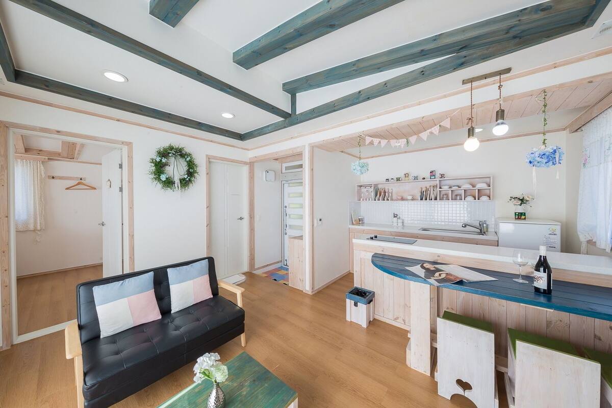 superior apartment, 1 bedroom, sea view | living area | flat-screen tv, heated floors