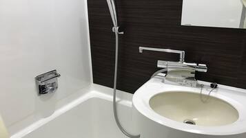 Combined shower/tub, hair dryer, slippers, bidet